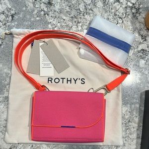 Rothy’s bright island pink belt bag with fluorescent orange strap. Never used